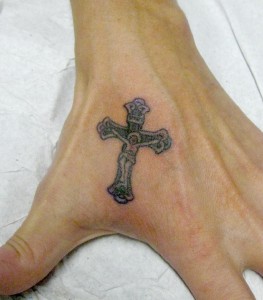 cross tattoo hand