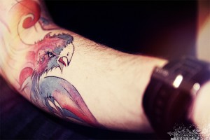 awesome phoenix tattoo on arm