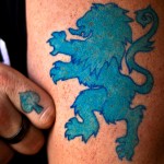 Blue lion tattoo