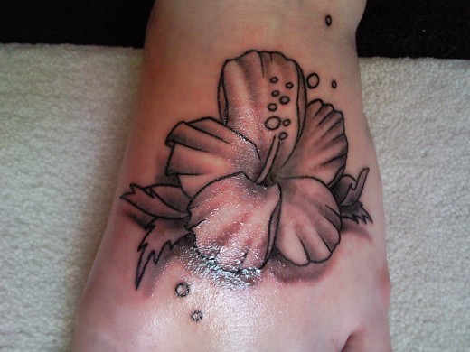 Hibiscus Flower Tattoo On Foot