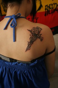 Symbol and Black Rose Tattoo