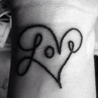 Tattoo  Word Love on Cursive Word Tattoo With The Word Love That Turns Into A Heart