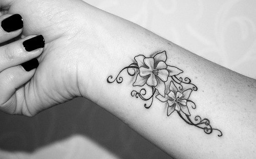 Gray Scale Flower Tattoo on the wrist
