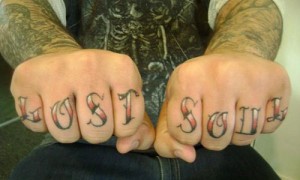 Fancy writing knuckles tattoo knuckles tattoo