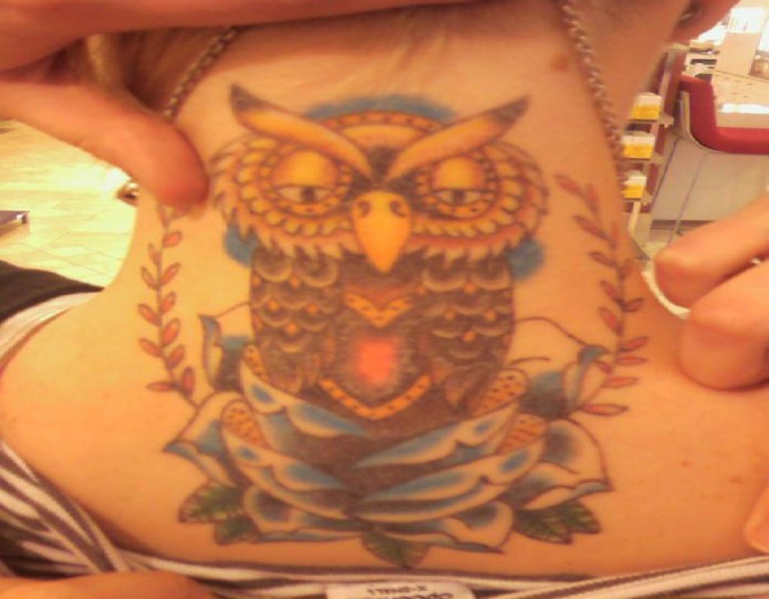 owl tattoo on neck