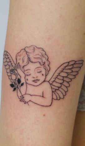 Baby Angel Tattoos - Tattoo Designs, Ideas & Meaning - Tattoo Me Now