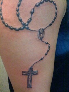 beautifully done rosary tattoo