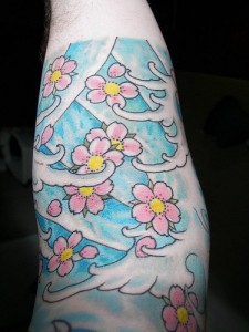 Colorful Flower Forearm Tattoo