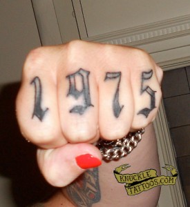 Year Knuckle Tattoo