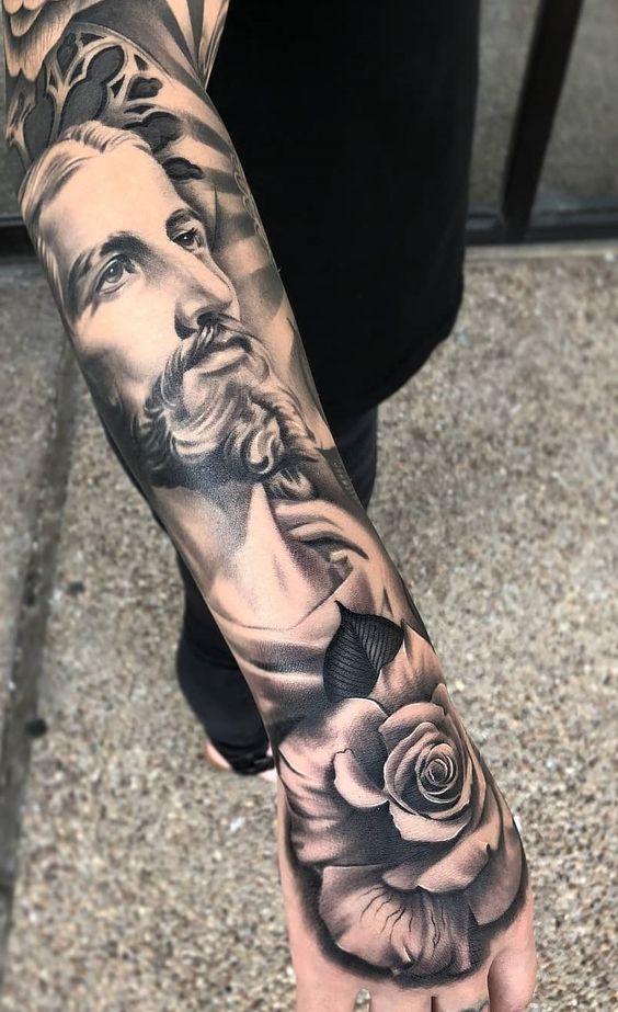 Proud to wear these jesus sleeve tattoos Sleeve tattoo on Stylevore