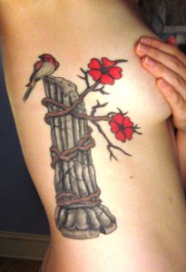 Flowers, Bamboo and A Bird ribcage tattoo