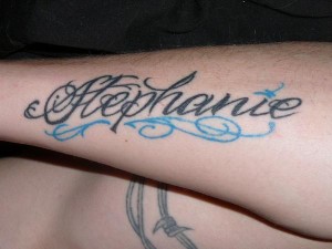 Black and Blue Name Tattoo