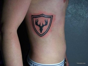 Awesome Badge Of a Deer Tattoo