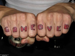 Inscription Knuckle Tattoo