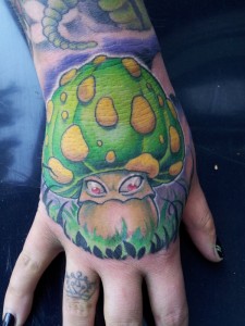 Green Monster Mushroom Tattoo