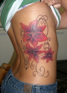 Lily Ribcage Tattoo