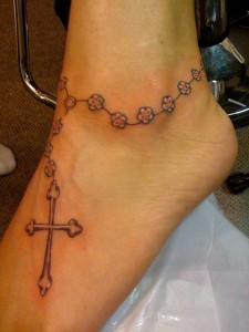 Rosary tattoo on foot