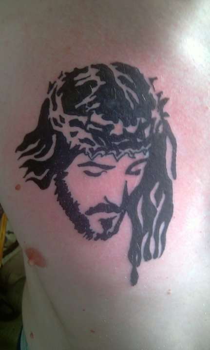 tribal jesus tattoo