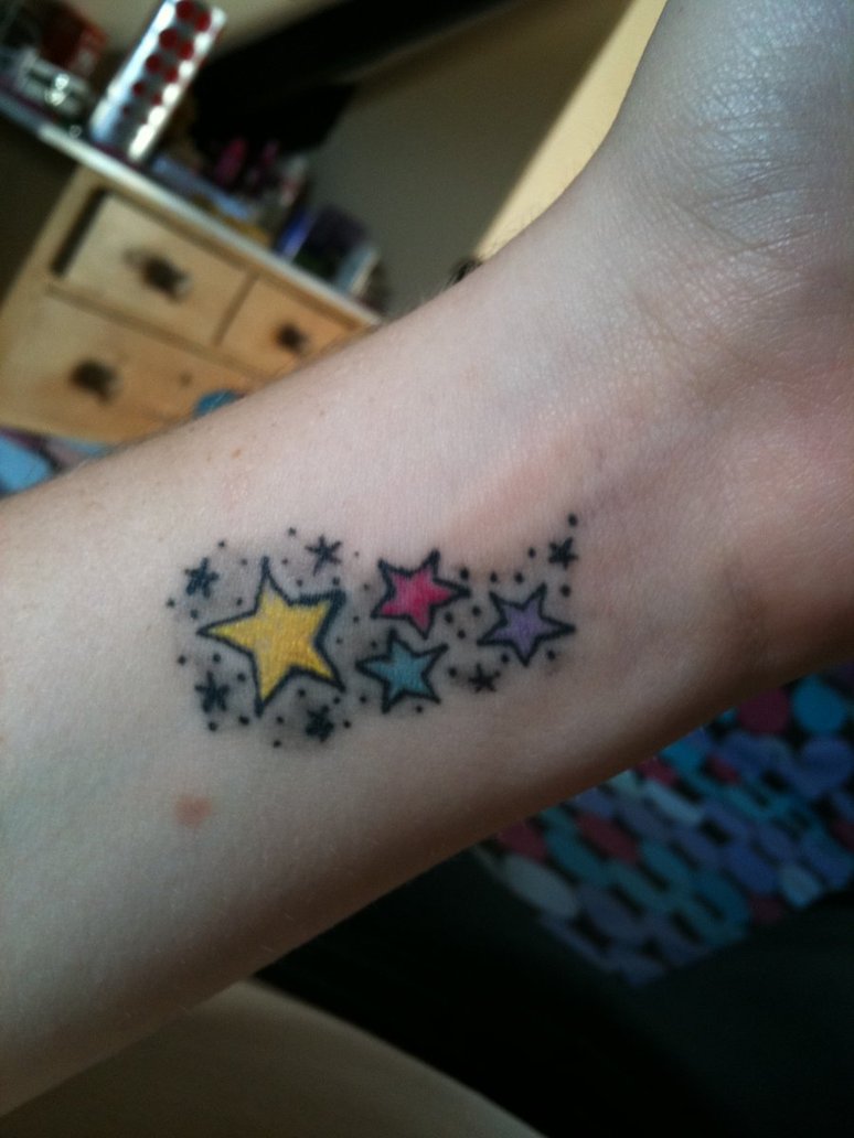 Many Stars Wrist Tattoo.