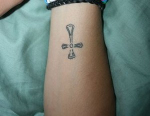 Playful Cross Tattoo