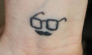 Glasses and Mustache Tattoo