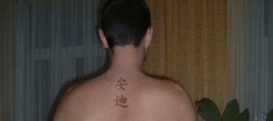 neck tattoo on male