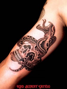 snake and skull tattoo snake skull body art