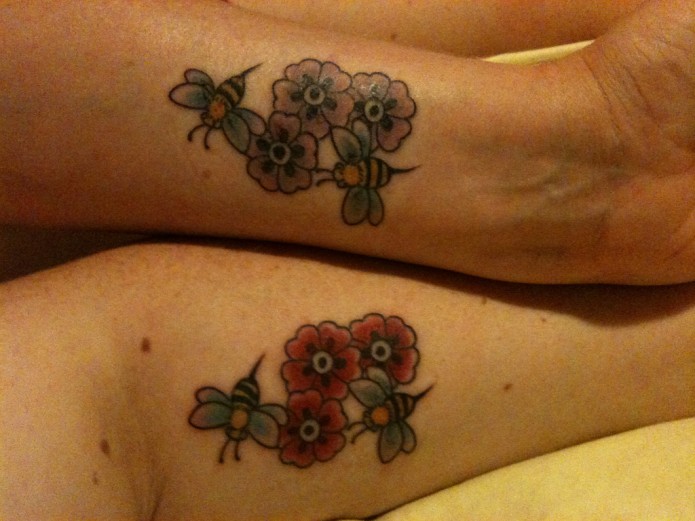 flower tattoo on forearm