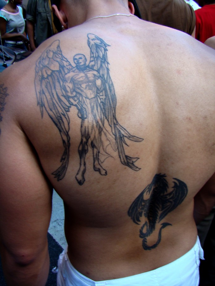 angel tattoo on shoulder blade
