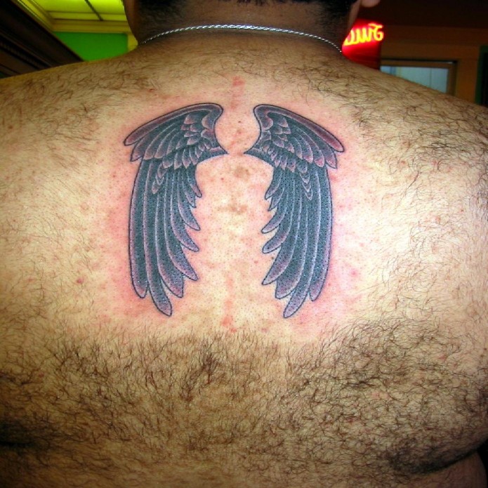 angel wings tattoo on back