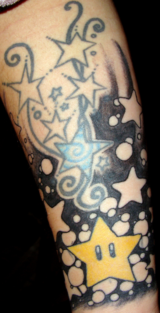 stars tatoo on arm