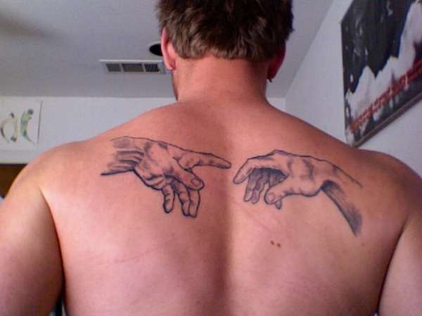 christian tattoo on back