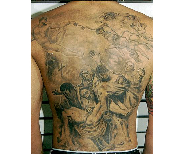 christian tattoo on back