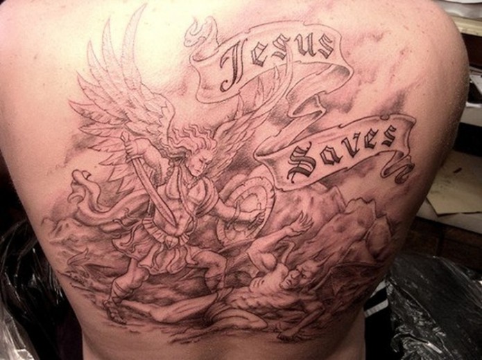 christian tattoo on back