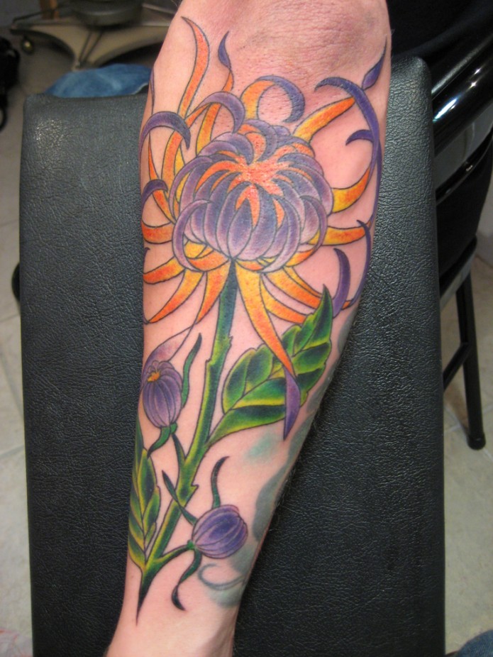 flower tattoo on forearm