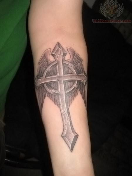 cross tattoo on arm
