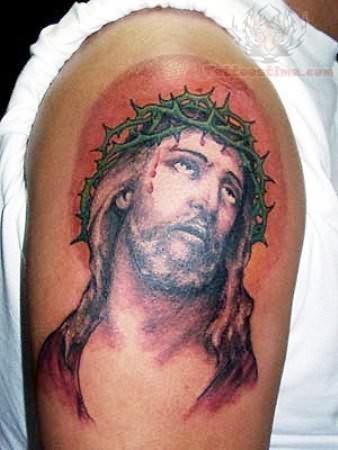 jesus tattoo on shoulder