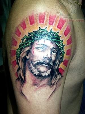 jesus tattoo on shoulder