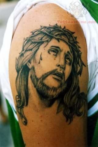 jesus tattoo on shoulder