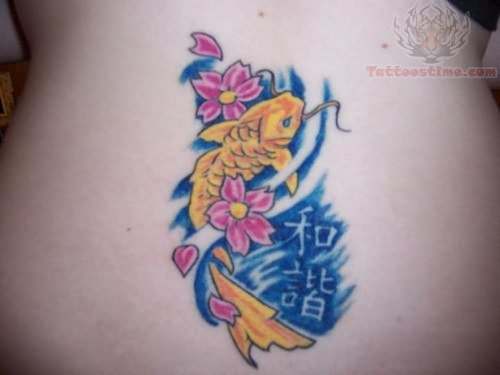 koi fish tattoo on lower back