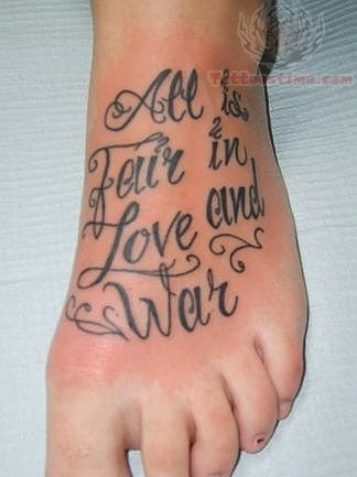 lettering tattoo on foot