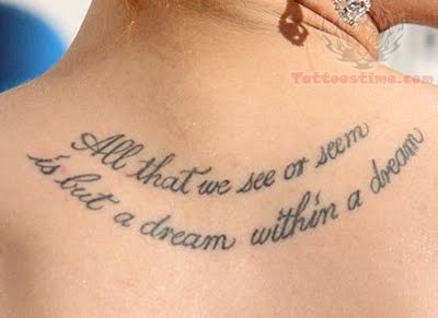 lettering tattoo on back