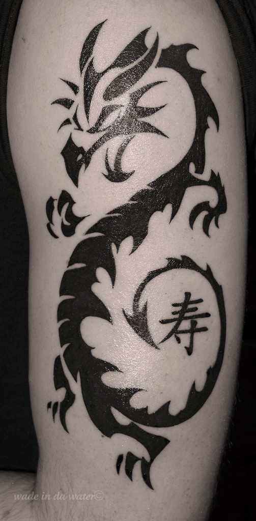 dragon tattoo on arm