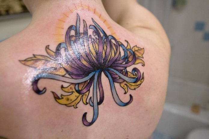 flower tattoo on back