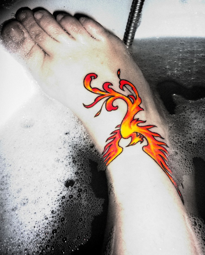 phoenix tattoo on foot