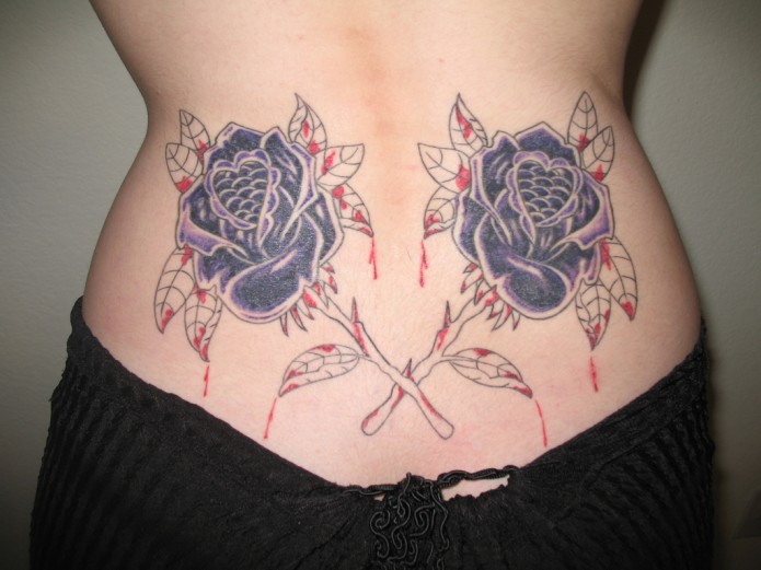 rose tattoo on waist