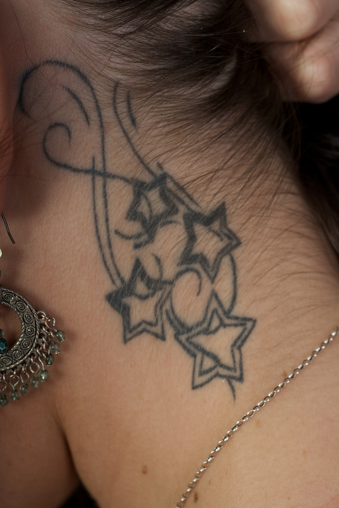 stars tattoo on neck