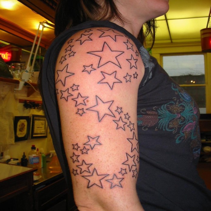 stars tattoo on arm