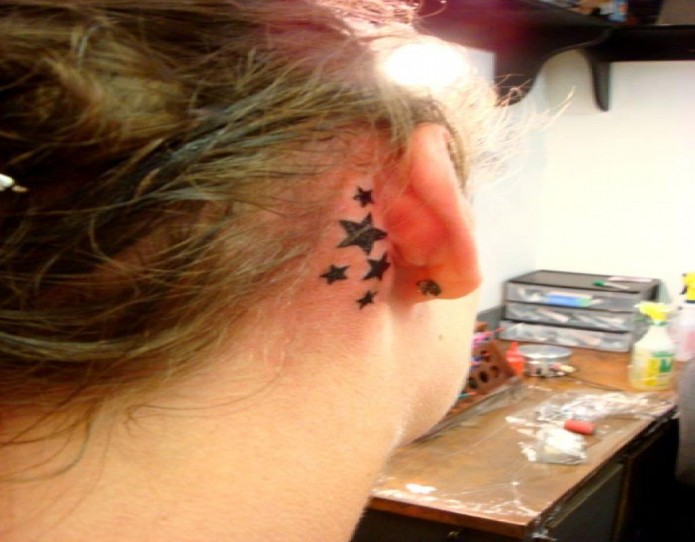 stars tattoo behind ear