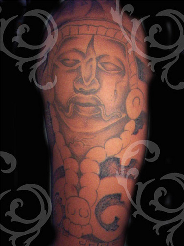 aztec tattoo on calf